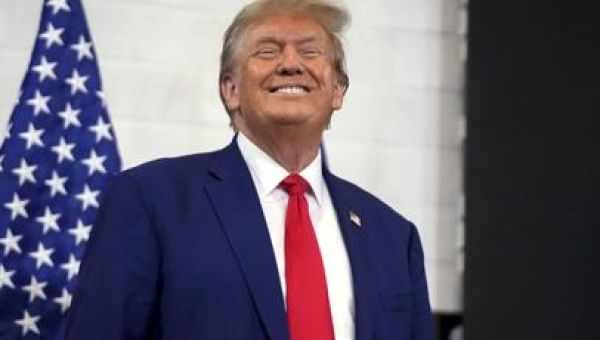 Trump embraces the Jan. 6 rioters on the trail. In court, his lawyers hope to distance him from them