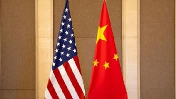US, China top military officials speak for first time in over a year