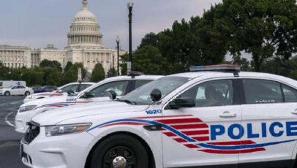 Three DC police officers shot and one injured, and suspect barricaded in home