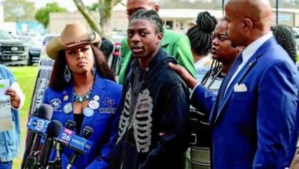 Court favors school in hair case