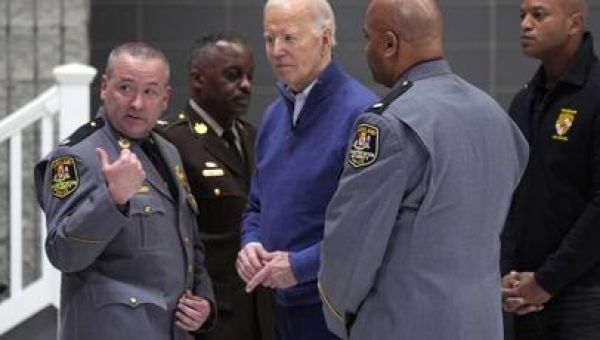 At Baltimore Key Bridge, Biden pledges federal support 'until the cement has dried'