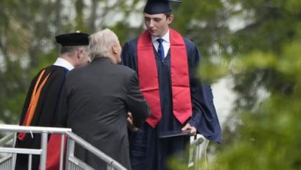 Donald Trump attends Barron's graduation before heading to fundraiser