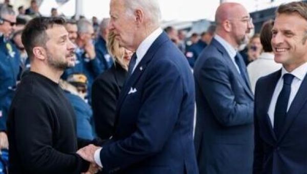 Biden urges US to protect democracy at key D-Day site