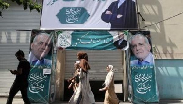 Low-key moderate leads tight Iran presidential race, source says