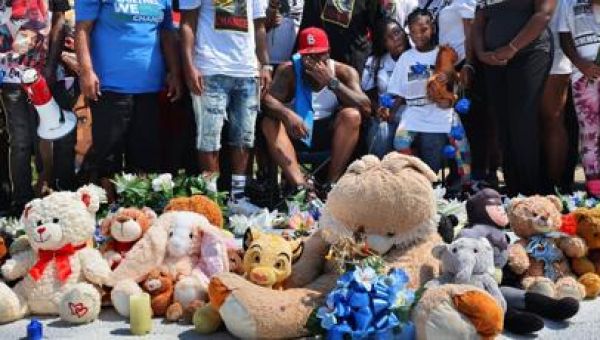 Hundreds march from Normandy High to Canfield Green to remember Michael Brown