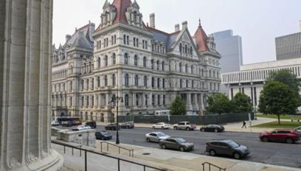 Ex-aide to 2 charged with being an agent of Chinese government