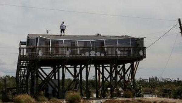 Hurricane Helene kills at least 90 in US; homes and memories washed away