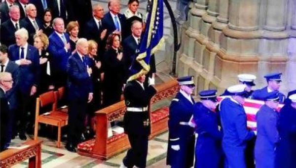 Carter lauded before being laid to rest