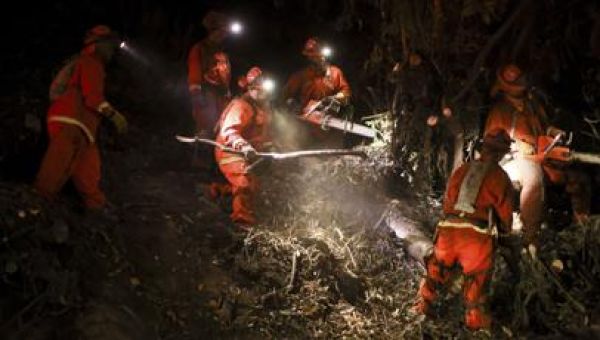 Firefighters prepare for increasing gusts following brief reprieve for LA area