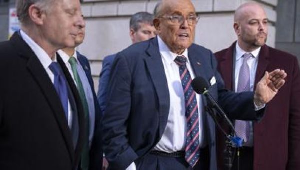 Giuliani settles legal fight with former Georgia election workers and agrees to stop defaming them
