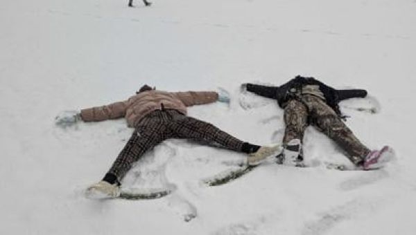 ‘Like Christmas Day’: Baton Rouge enjoys rare winter wonderland; LSU students see first snowfall