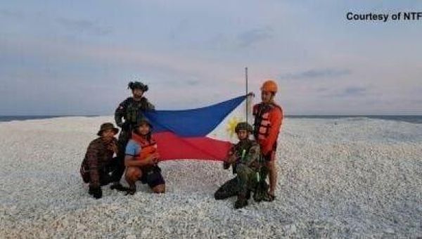 China, Philippines trade barbs over disputed reef