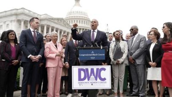 In case against lawmaker, Justice Department shows readiness to act against Trump foes