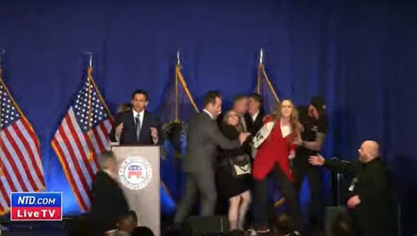 Two women rush stage to protest Ron DeSantis speech