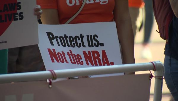 Protesters rally for gun reform outside NRA Convention in Dallas