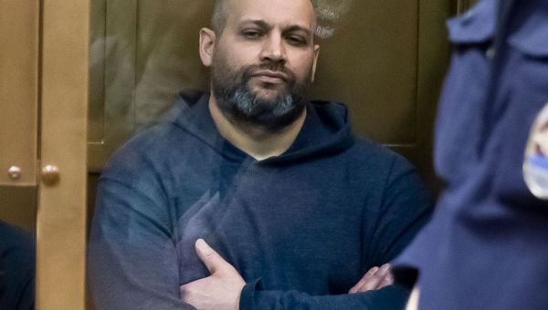 Russian convicted over journalist’s death wins pardon after serving in Ukraine