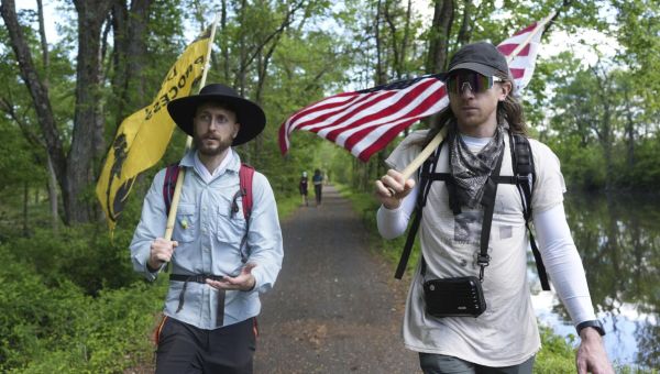 Quakers march against Trump’s crackdown on immigrants, carrying on a long tradition