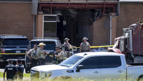 Police: 1 dead, 13 injured after tractor-trailer rams Texas public safety office