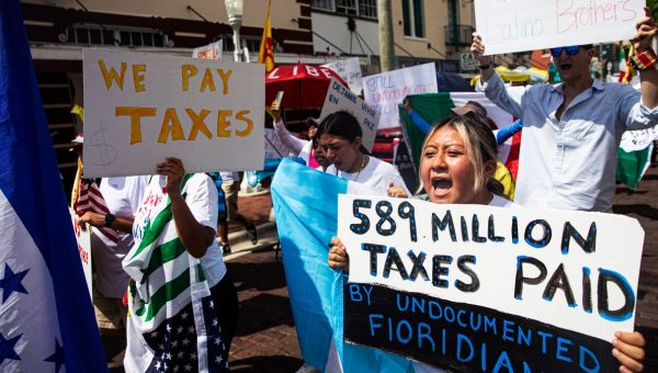 Southwest Florida residents march to protest recent immigration legislation