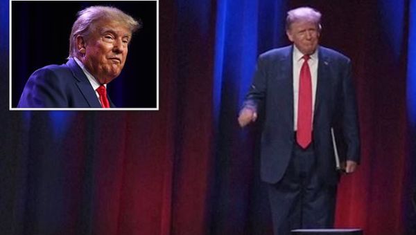 Moment indicted Trump struts onto Iowa campaign stage to ironic song
