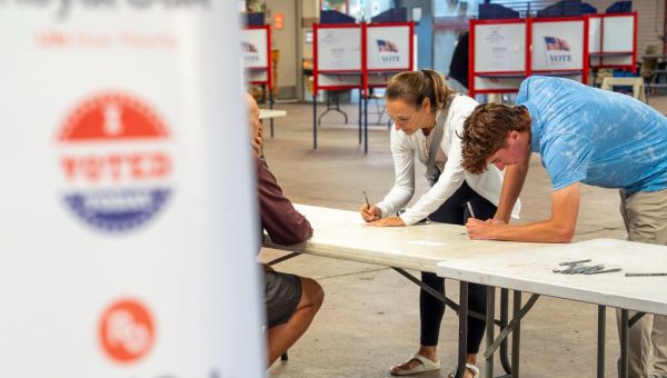 More than 1.2 million people in Michigan voted in person before Election Day. Here are the numbers