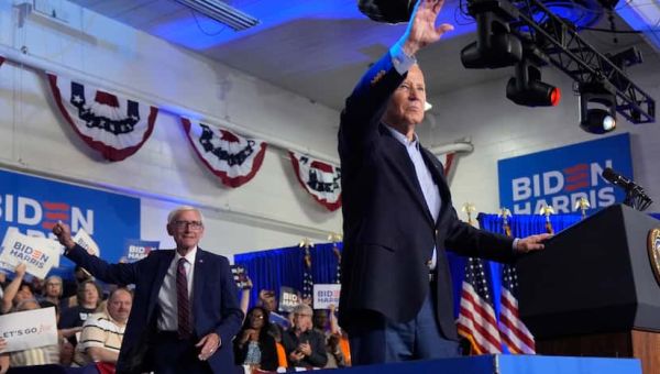 Biden says he's 'staying in the race' as he scrambles to save candidacy