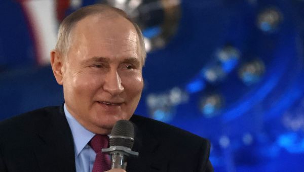 Putin laughs minutes after he was informed of Alexei Navalny’s death