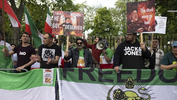 Protesters outside Iran’s London embassy celebrate death of Raisi