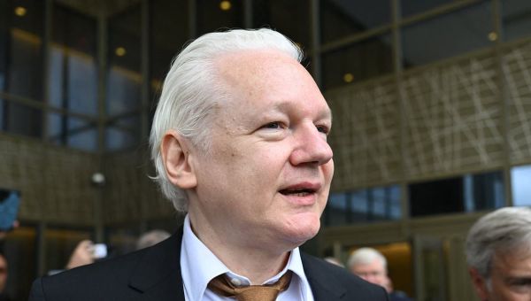 Inside the secret deal that freed Julian Assange