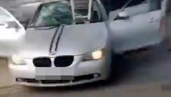 Mob of racist thugs drag Asian man out of his car and smash it up