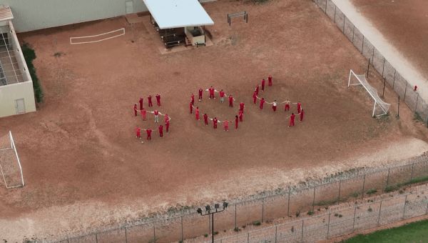 Detainees at immigration facility in Texas form SOS message in front of Reuters drone