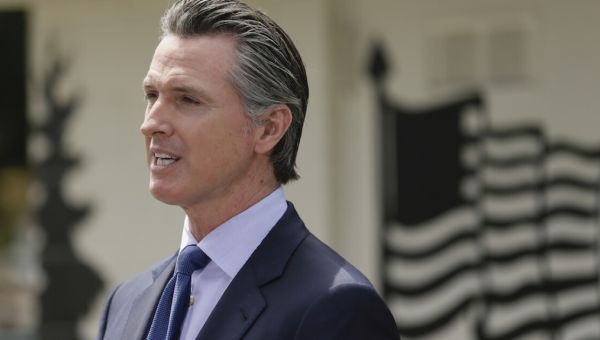 Newsom proposes pausing expansion of health care to immigrants