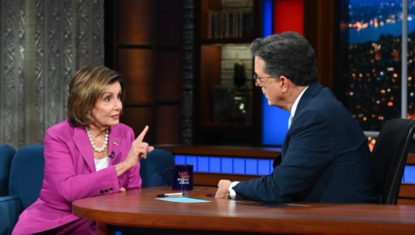 Stephen Colbert calmly responds to protesters shouting during Nancy Pelosi interview