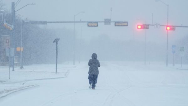 Dangerously cold temperatures continue to blast much of US, keeping schools closed and flights grounded