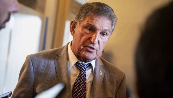 Top senator yanks his endorsement of Harris over threat of power grab