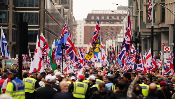 Tommy Robinson march – LIVE: Thousands join extremist protest after Robinson charged with terror offence