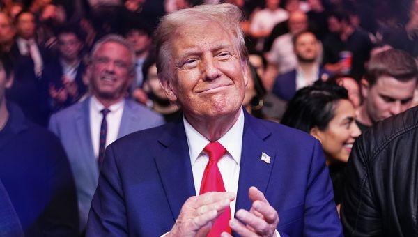 Jon Jones celebrates with Donald Trump after beating Stipe Miocic