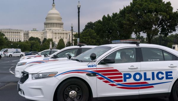 Three DC police officers shot and one injured, and suspect barricaded in home - Washington Examiner