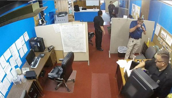Kansas prosecutor withdraws search warrants used in controversial newspaper raid after owner's death