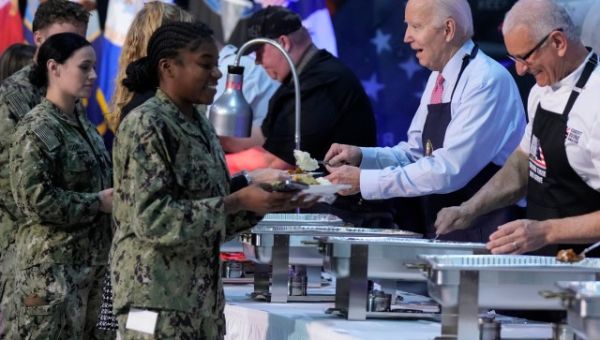 Bidens start Thanksgiving early, visit service members