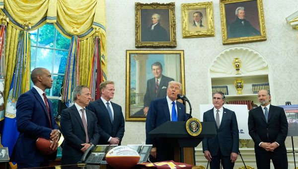 Trump and NFL commissioner Roger Goodell announce the 2027 NFL draft in DC