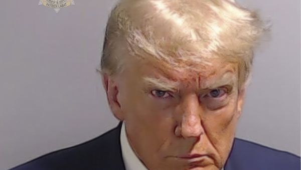 One image, one face, one American moment: The Donald Trump mug shot – WTOP News