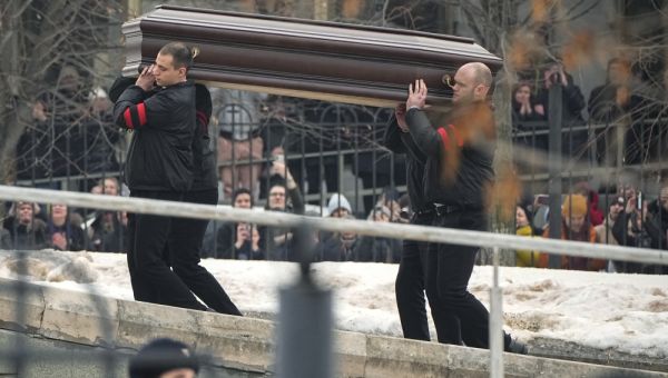 Thousands gather to mourn as Alexei Navalny is laid to rest after dying in prison