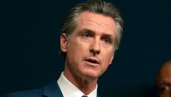 California Gov. Gavin Newsom signs law requiring big businesses to disclose emissions