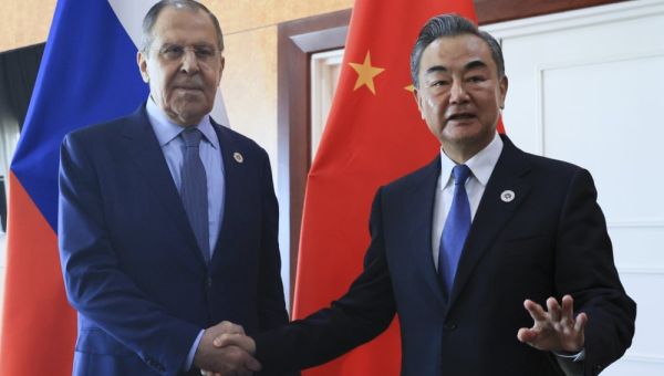 China's foreign minister signals deeper ties with Russia - Portland Press Herald