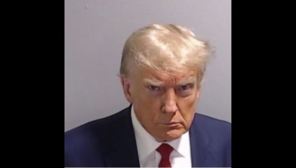 Did You Notice That Trump Wrote a Few Lines Under His Mugshot?
