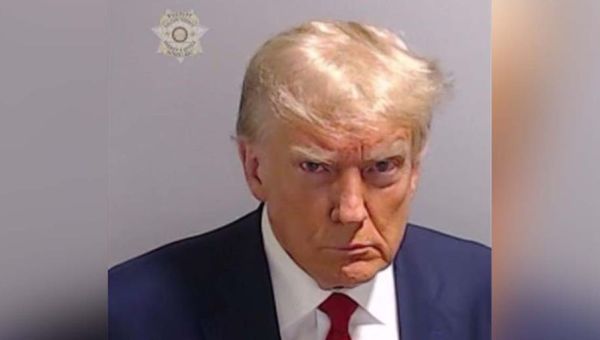 What Trump’s scowling mugshot means for an America full of rage