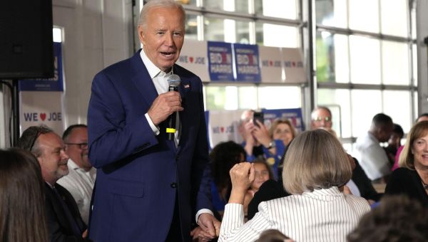 ‘I’m not going anywhere,’ Biden tells Michigan supporters