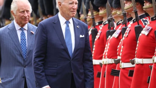 Video: King Charles Leads Confused Biden Away at Castle Reception