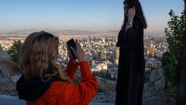 One year into unrest, Iran locks horns with women over hijab